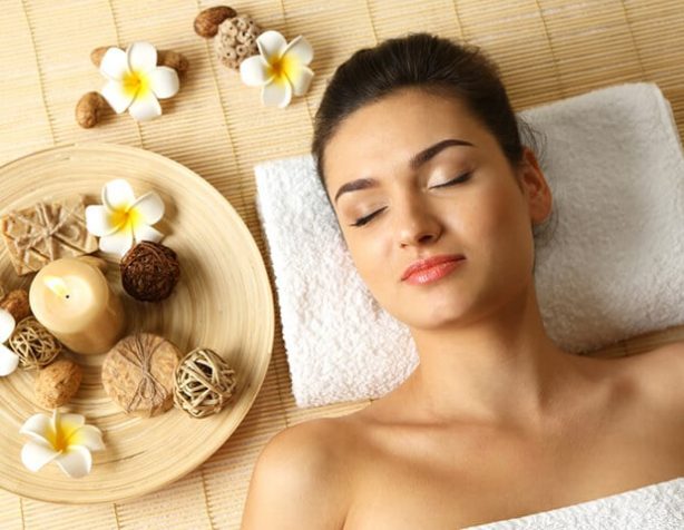 Young Woman on Massage Table — Beautician in Coffs Harbour, NSW
